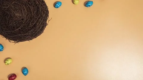 Easter eggs in basket, color plate top motion animation. Chocolate easter eggs Stock Footage 231566660
