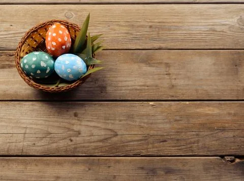 Easter eggs in a basket, copyspace Stock Photos