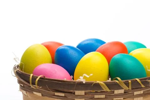 Easter eggs in basket isolated Foto stock