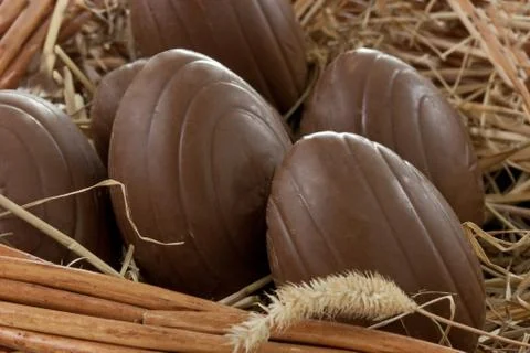 Easter eggs in a basket Stock Photos