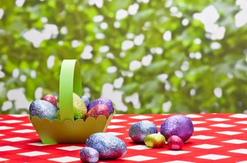 Easter eggs in basket Stock Photos