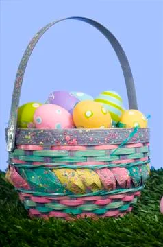 Easter eggs in basket Stock Photos