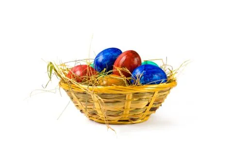 Easter eggs in basket Stock Photos