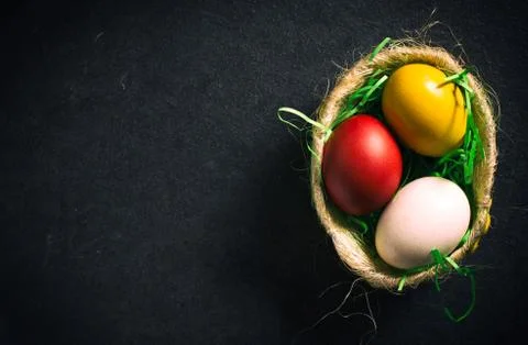 Easter eggs in the basket Stock Photos