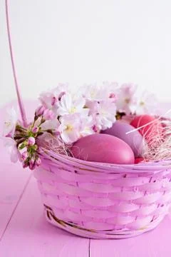 Easter eggs in basket Stock Photos
