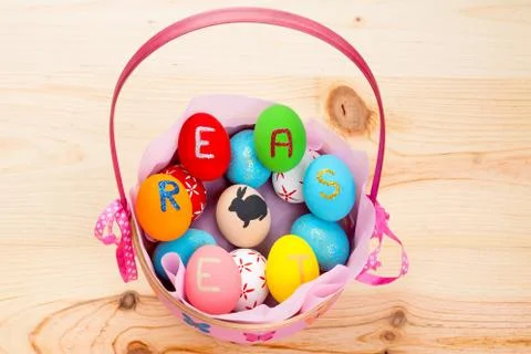 Easter eggs in basket Stock Photos