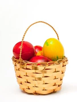 Easter eggs in basket Stock Photos