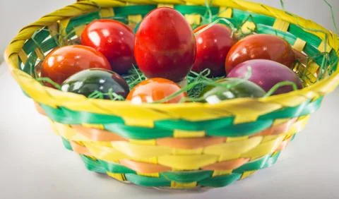 Easter eggs in basket Stock Photos