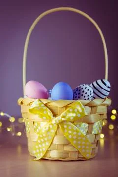 Easter eggs in a basket Stock Photos