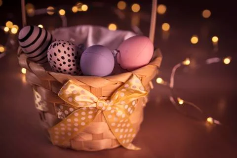 Easter eggs in a basket Stock Photos
