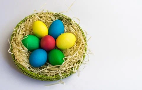 Easter eggs in a basket Stock Photos