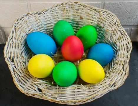 Easter eggs in a basket Stock Photos