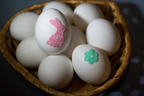 Easter eggs in a basket Stock Photos