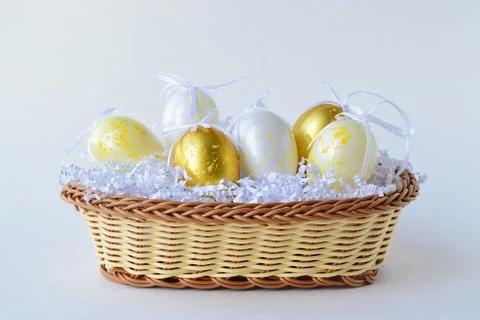 Easter eggs in a basket Stock Photos