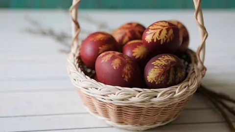 Easter eggs in a basket on a rustic wooden background. multicolored easter eggs Stock Footage 106793351