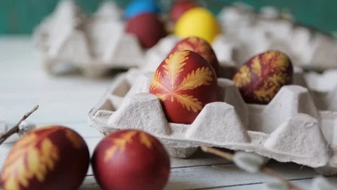 Easter eggs in a basket on a rustic wooden background. multicolored easter eggs Stockbeeldmateriaal 106793386