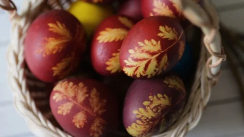 Easter eggs in a basket on a rustic wooden background. multicolored easter eggs Stock-Footage 106793463