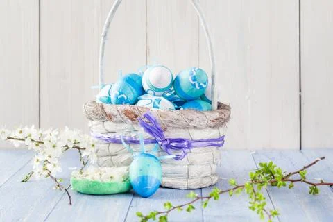 Easter eggs basket spring branches Stock Photos
