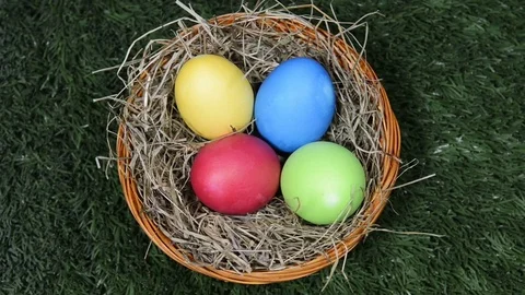 Easter eggs in basket top view Stock Footage 72729944