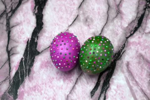 Easter eggs in beads in different colors . Stock Photos