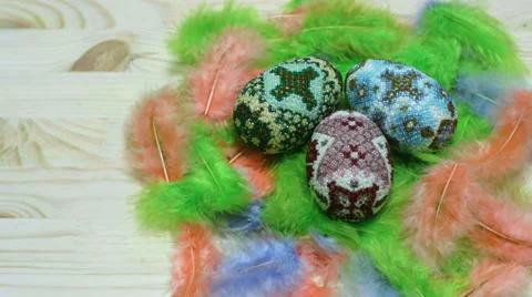 Easter eggs from beads on feather nest Stock Footage 60670921