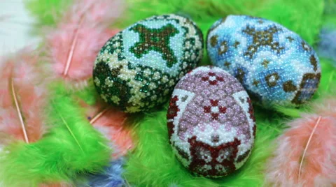 Easter eggs from beads on feather nest 動画素材 60671174