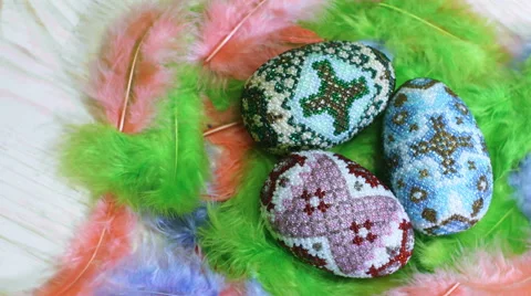 Easter eggs from beads on feather nest Stock Footage 60672030