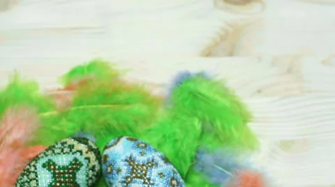 Easter eggs from beads on feather nest Stock Footage 60672323