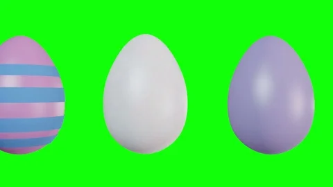 Easter eggs being decorated in different ways - looping animation on green. Stock Footage 73985654