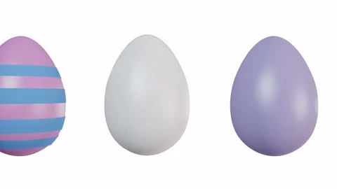 Easter eggs being decorated in different ways - looping animation on white. Stock Footage 73985660