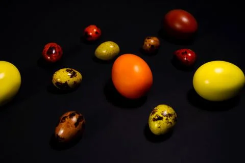 Easter eggs on black background. Copy space Stock Photos