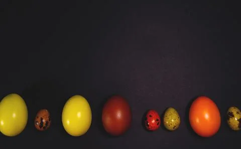 Easter eggs on black background. Copy space 스톡 사진