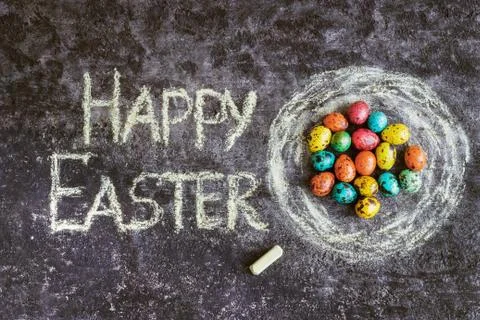 Easter eggs on a black background, Easter concept, text Stock Photos