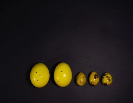 Easter eggs on black background Stock Photos