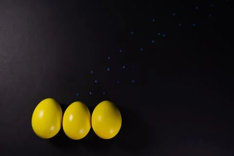 Easter eggs on black background Stock Photos