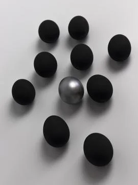 Easter eggs in black on a white background, easter composition, copy space Stock Photos