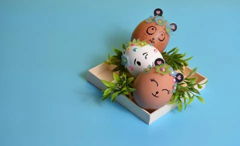 Easter eggs on a blue background. Easter. Stock Photos