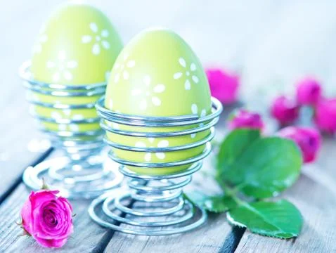 Easter eggs on blue table Stock Photos