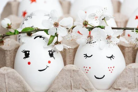 Easter eggs with branch of flowers Stock Photos