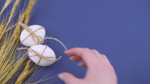 Easter eggs on a bright blue background. Stock Footage 122312144