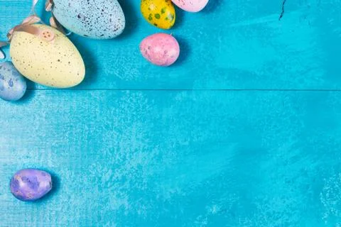 Easter eggs on bright blue background Stock Photos