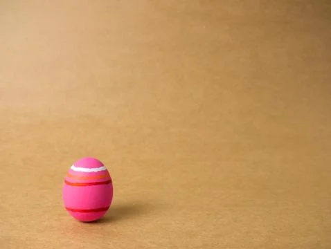 Easter eggs on the brown background. Stock Photos