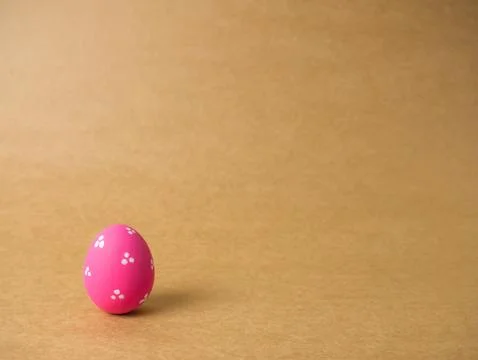 Easter eggs on the brown background. Stock Photos