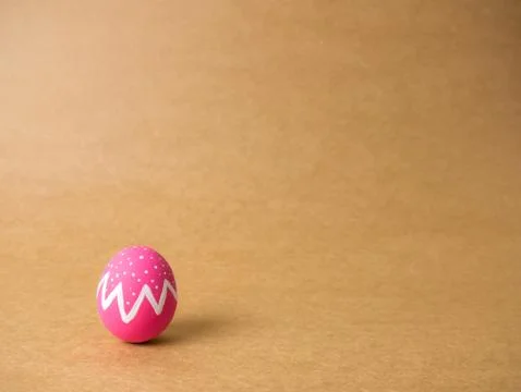 Easter eggs on the brown background. Stock Photos