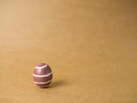 Easter eggs on the brown background. Stock Photos