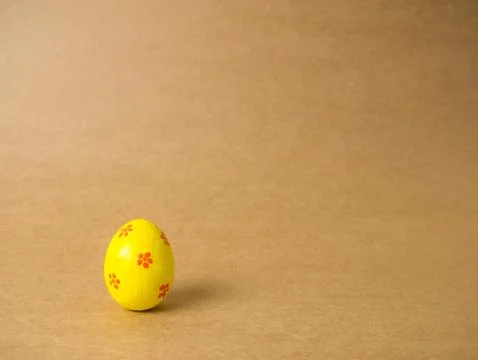 Easter eggs on the brown background. Stock Photos