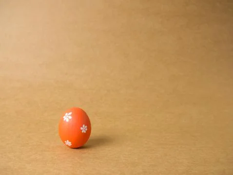 Easter eggs on the brown background. Stock Photos