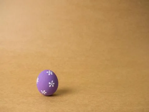 Easter eggs on the brown background. Stock Photos