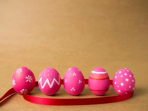 Easter eggs on the brown background. Stock Photos