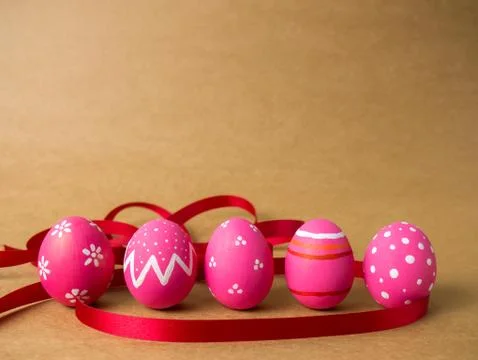 Easter eggs on the brown background. Stock Photos